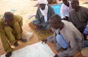 Participants discuss land use in a village in Niger