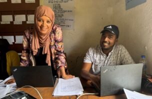 Meskan Woreda land office staff provide land transaction services in a local community.