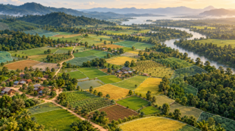 Conceptual illustration of farms, forests, settlements and a river with land parcel boundaries.